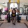 Modern fitness center with a range of equipment including treadmills, free weights, and strength machines.