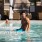 Pool-side ramada with shaded seating, perfect for relaxing and socializing by the water