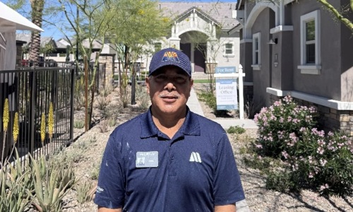 a staff member standing outside